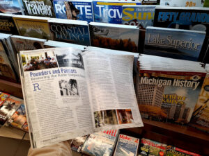 an open magazine at a magazine rackopen to a North Manitou Island Story